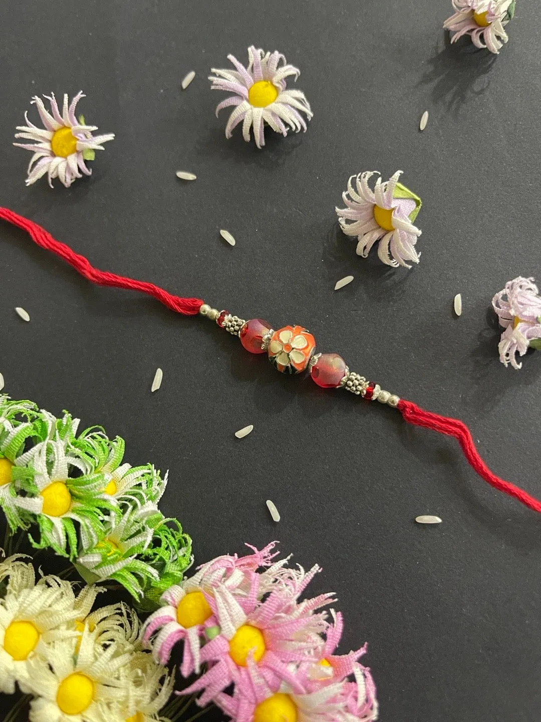 Designer Rakhi Meenakari Orange Kundan Bead With Red Thread Rakhi For Raksha Bandhan