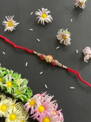 Designer Rakhi Meenakari Orange Kundan Bead With Red Thread Rakhi For Raksha Bandhan