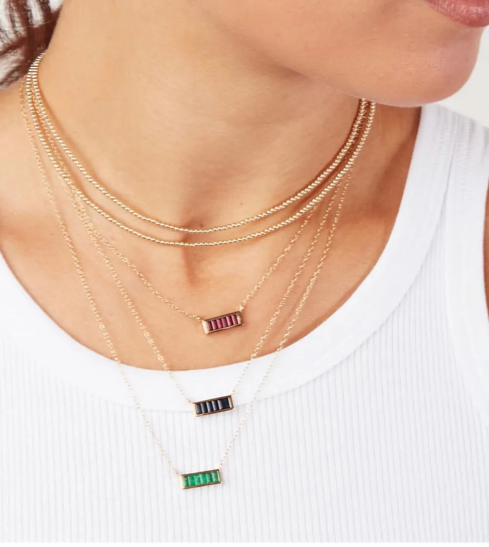 Emerald baguette bar necklace