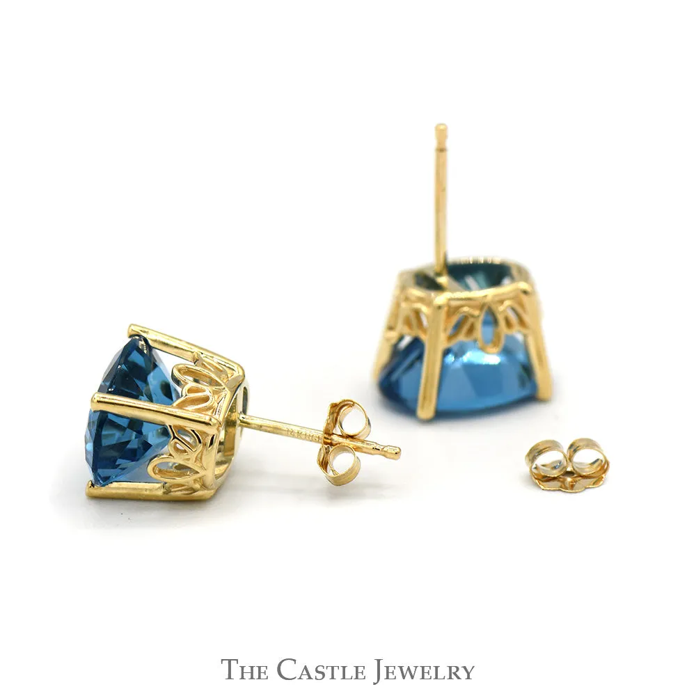 Oval Blue Topaz Studs in 14k Yellow Gold Basket Mounting