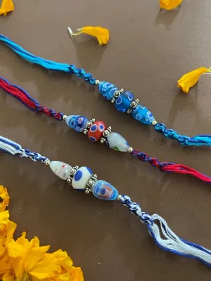 (Rakhi Set of 3) Designer Rakhi With White/Blue/Red Beads Multicolor Thread Rakhi For Rakshabandhan